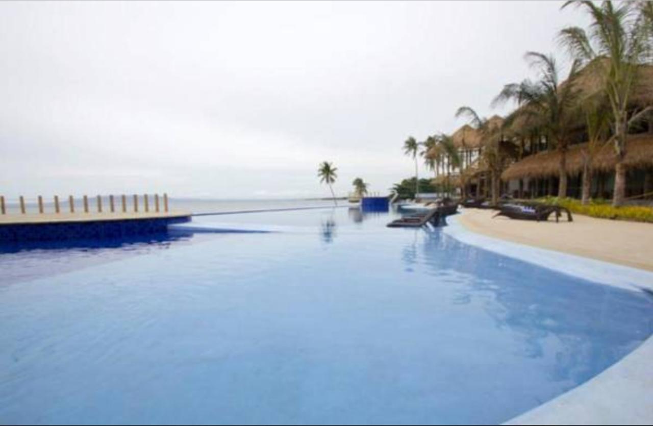 The Bellevue Resort Panglao Exteriör bild Infinity pool at the Iberostar Grand Hotel, Playa del Carmen, Mexico
